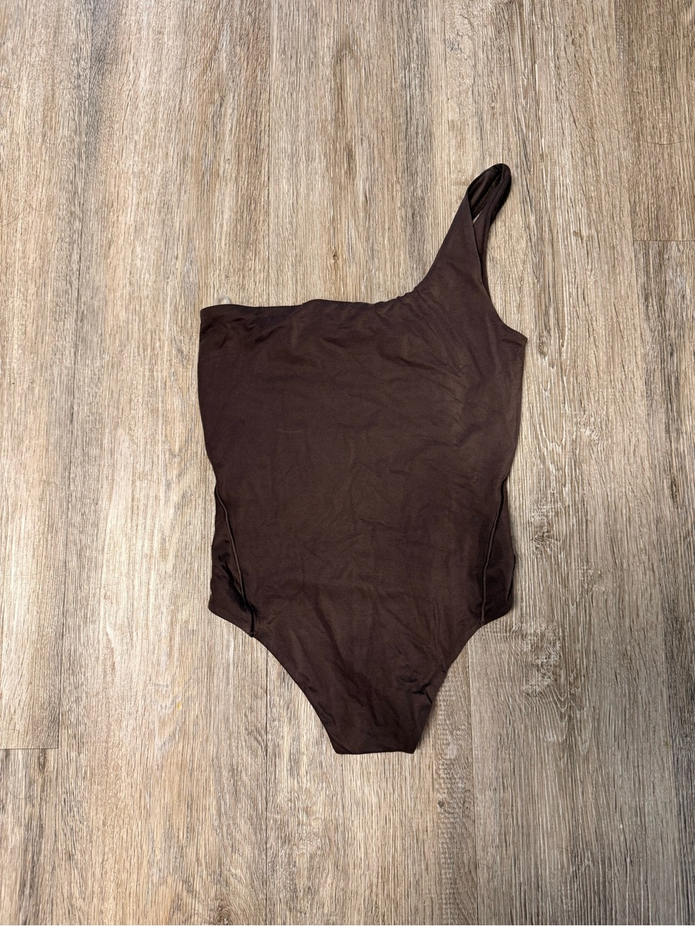 One-Shoulder Chocolate Brown Lululemon Bodysuit.